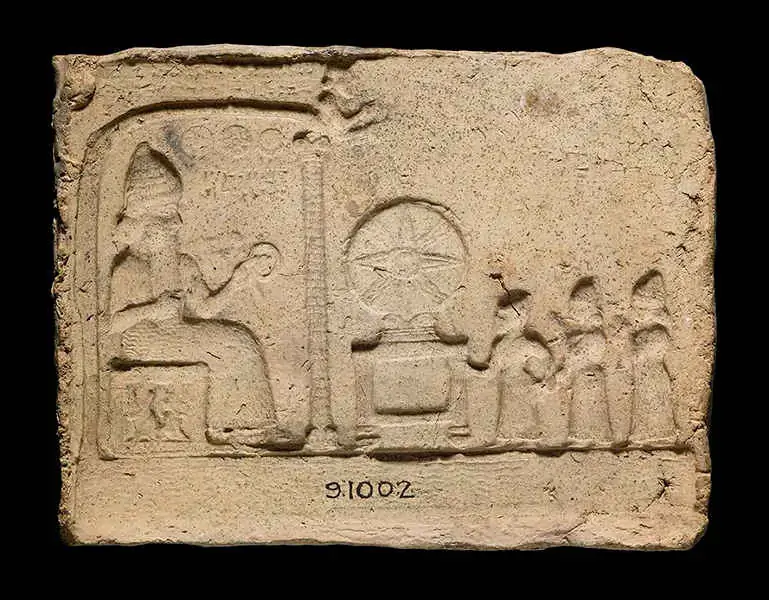 Tablilla de arcilla que representa al Dios Sol con la inscripción Nabopolasar